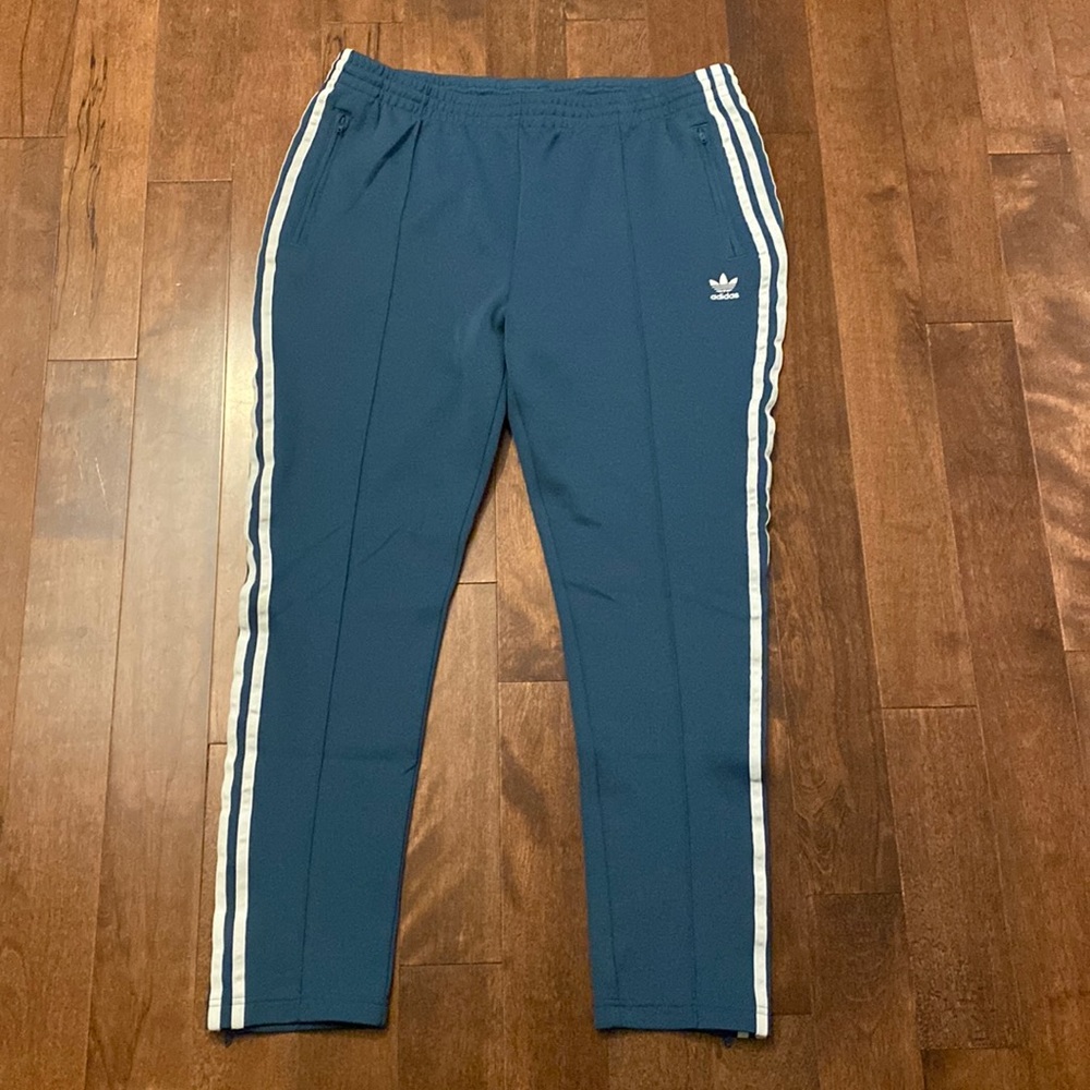 NWOT - never worn Adidas track suit pants.